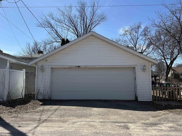 detached garage with fence