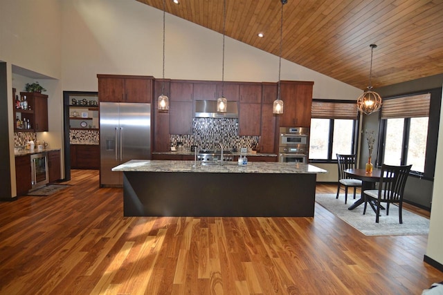 kitchen featuring backsplash, beverage cooler, dark wood-type flooring, appliances with stainless steel finishes, and wood ceiling