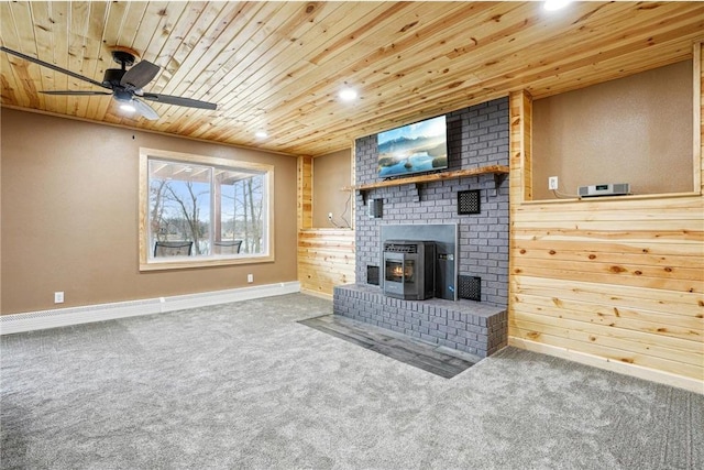 1794 W White Ash Dr, Balsam Lake, WI 54810 - living area featuring wooden ceiling, carpet flooring, a ceiling fan, baseboards, and a fireplace
