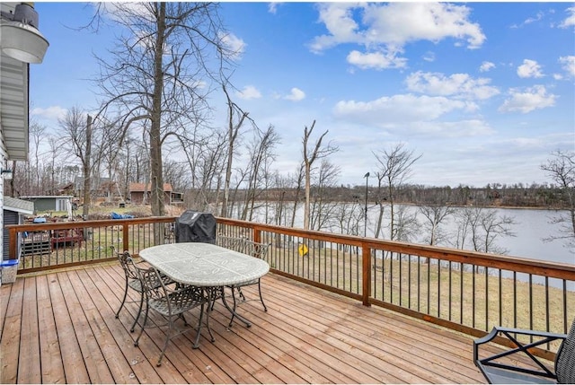 1794 W White Ash Dr, Balsam Lake, WI 54810 - wooden terrace with a water view, grilling area, and outdoor dining space