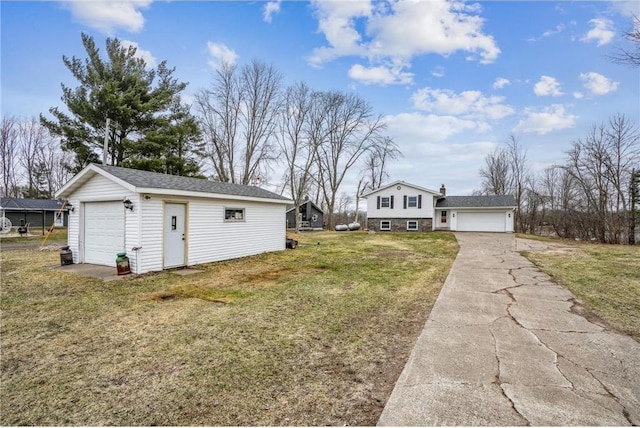 1794 W White Ash Dr, Balsam Lake, WI 54810 - view of grassy yard with a garage and an outbuilding
