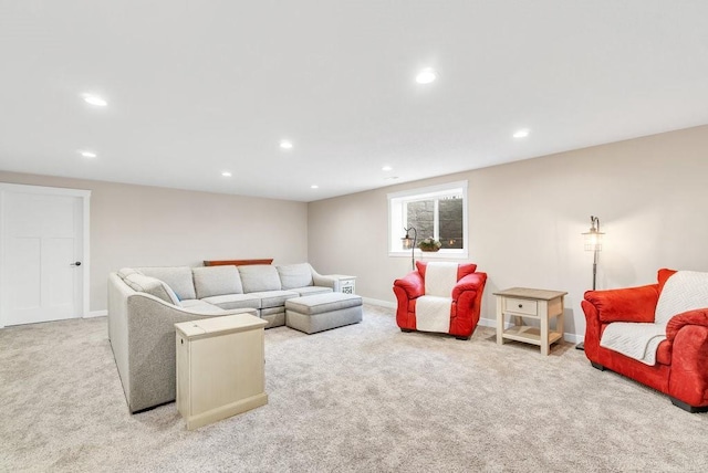 carpeted living room featuring recessed lighting and baseboards
