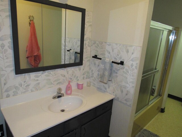 3012 16th St, Menominee, MI 49858 - full bath with wallpapered walls, vanity, and a shower with door
