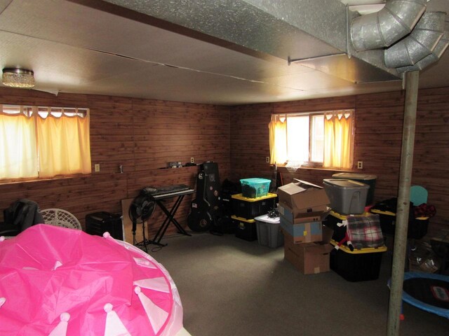 3012 16th St, Menominee, MI 49858 - bedroom with wooden walls and carpet