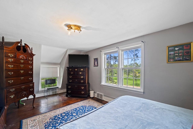 1941 S 124th St, New Berlin, WI 53151 - bedroom with lofted ceiling, visible vents, baseboards, and wood finished floors