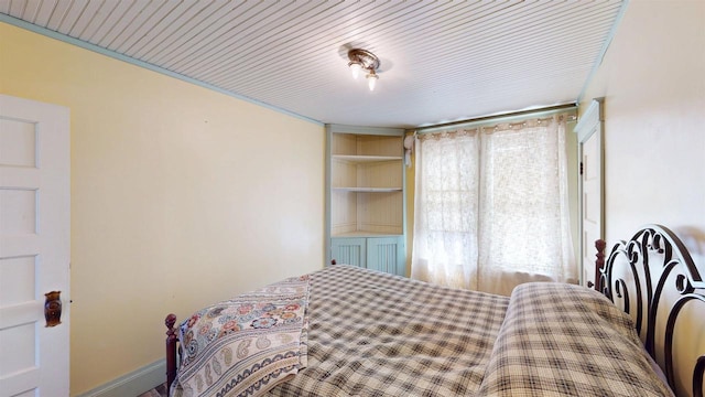bedroom with wood ceiling