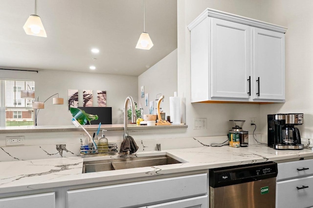 kitchen with white cabinets, decorative light fixtures, dishwasher, a sink, and light stone countertops