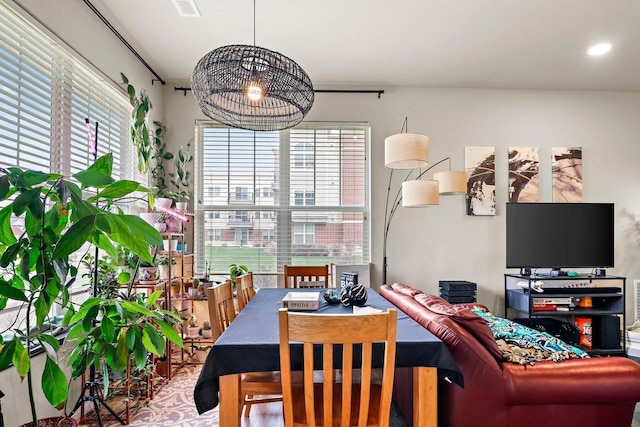 dining room featuring plenty of natural light