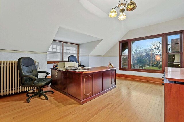 3316 W Wisconsin Ave, Milwaukee, WI 53208 - office area with a chandelier, light wood-style floors, baseboards, and lofted ceiling