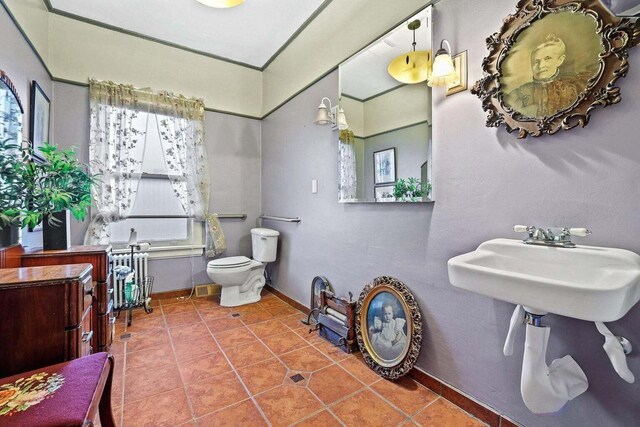 3316 W Wisconsin Ave, Milwaukee, WI 53208 - full bathroom with toilet, baseboards, and tile patterned flooring
