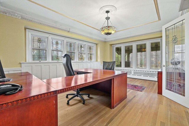 3316 W Wisconsin Ave, Milwaukee, WI 53208 - home office featuring light wood-style floors, a baseboard radiator, and ornamental molding
