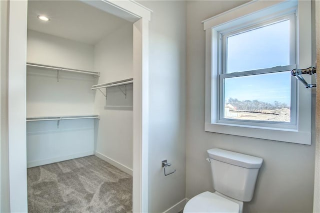 E5215 Queens Dr, Eleva, WI 54738 - bathroom with toilet and baseboards