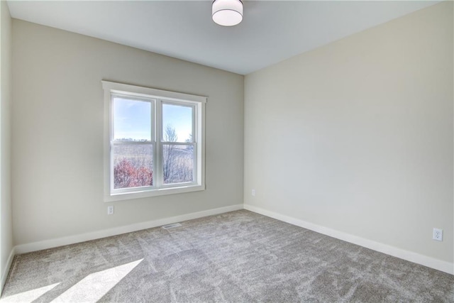 E5215 Queens Dr, Eleva, WI 54738 - carpeted empty room featuring baseboards