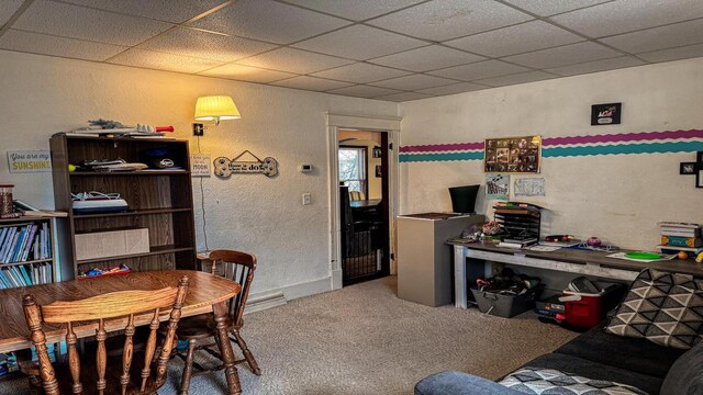 816 Royalton St, Waupaca, WI 54981 - dining space featuring carpet flooring, a drop ceiling, and a textured wall