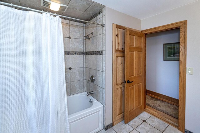 W340S2401 County Road C, Oconomowoc, WI 53066 - full bath featuring shower / tub combo, baseboards, and tile patterned flooring