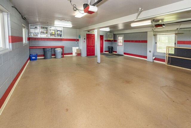 W340S2401 County Road C, Oconomowoc, WI 53066 - garage with a garage door opener and concrete block wall