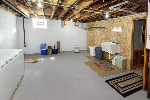 W340S2401 County Road C, Oconomowoc, WI 53066 - basement with a sink and fridge