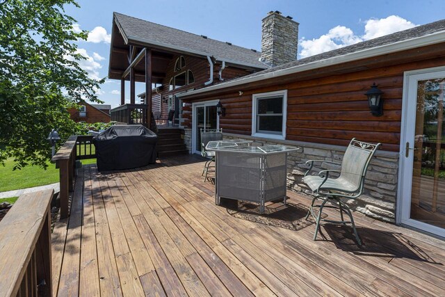 W340S2401 County Road C, Oconomowoc, WI 53066 - deck featuring outdoor dining space and stairway