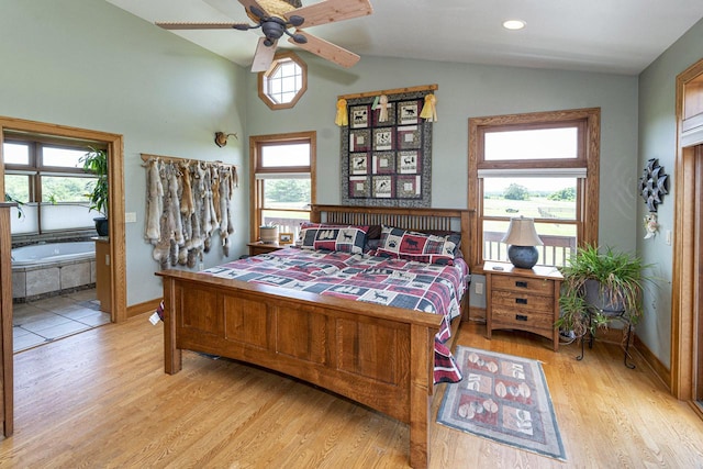 W340S2401 County Road C, Oconomowoc, WI 53066 - bedroom with ceiling fan, light wood finished floors, baseboards, and vaulted ceiling