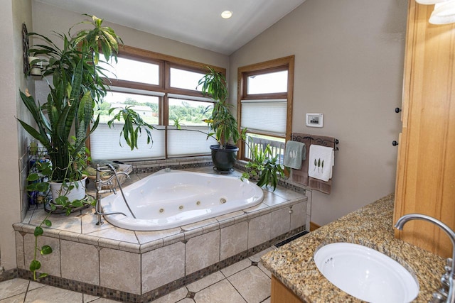 W340S2401 County Road C, Oconomowoc, WI 53066 - full bathroom featuring tile patterned floors, a jetted tub, vanity, and lofted ceiling