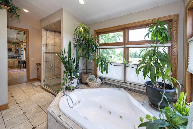 W340S2401 County Road C, Oconomowoc, WI 53066 - full bath featuring baseboards, a whirlpool tub, a shower stall, recessed lighting, and tile patterned flooring