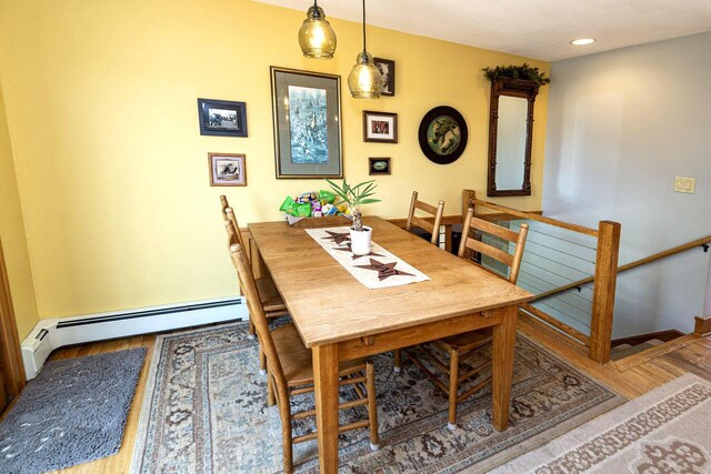 W340S2401 County Road C, Oconomowoc, WI 53066 - dining space with recessed lighting, a baseboard heating unit, baseboards, and wood finished floors
