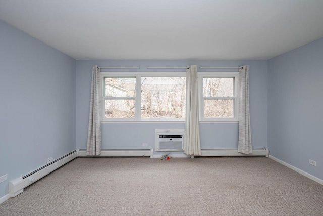 empty room featuring a baseboard radiator, a wall unit AC, and carpet flooring
