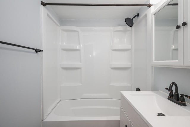 bathroom featuring vanity and shower / bathing tub combination