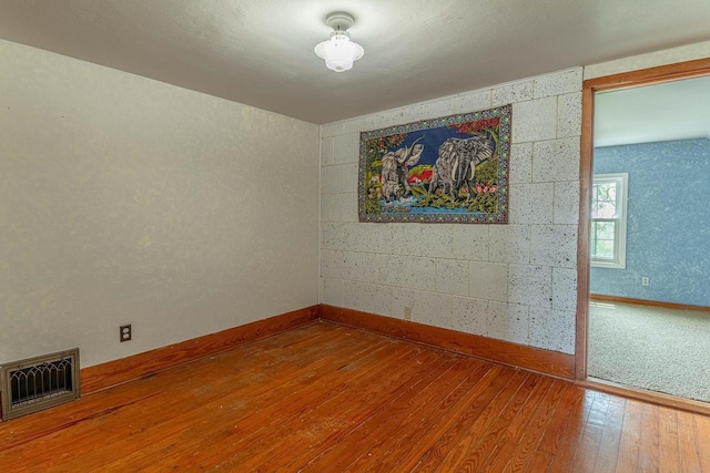 N1616 Haddinger Rd, Monroe, WI 53566 - empty room with baseboards and hardwood / wood-style floors