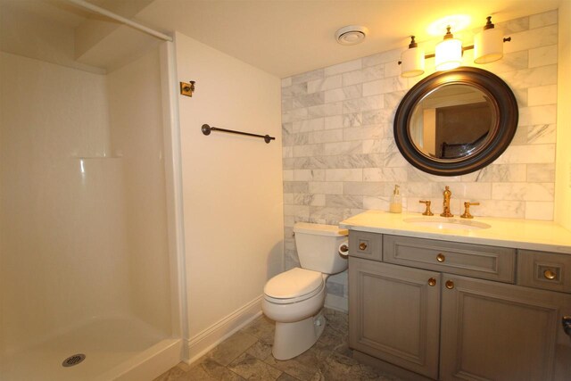 4786 Cardinal Ln, Sun Prairie, WI 53590 - bathroom with toilet, tile walls, baseboards, a shower stall, and vanity