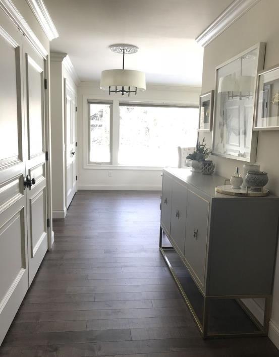 4786 Cardinal Ln, Sun Prairie, WI 53590 - interior space featuring dark wood finished floors and ornamental molding