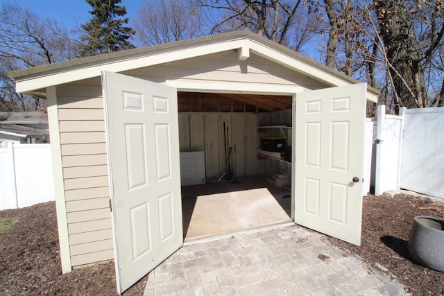 4786 Cardinal Ln, Sun Prairie, WI 53590 - view of shed featuring fence