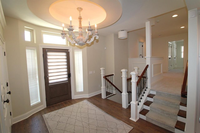 4786 Cardinal Ln, Sun Prairie, WI 53590 - foyer entrance with baseboards, recessed lighting, a notable chandelier, wood finished floors, and a raised ceiling