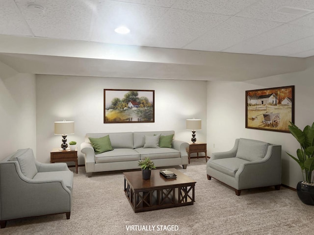 living room featuring baseboards and carpet floors