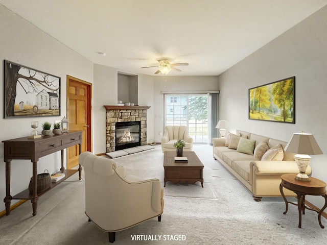 carpeted living room with ceiling fan and a fireplace