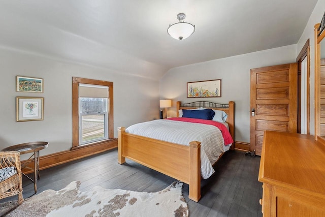 E3625 Wilkinson Rd, La Valle, WI 53941 - bedroom featuring dark wood-style flooring, baseboards, and lofted ceiling