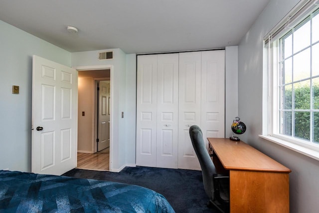 3410 Valley Ridge Rd Unit 1, Middleton, WI 53562 - carpeted bedroom featuring a desk, a closet, and baseboards