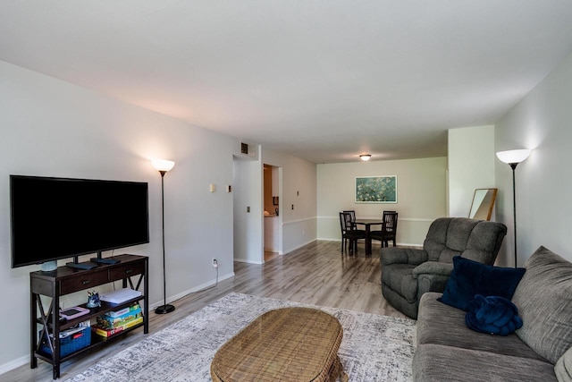 3410 Valley Ridge Rd Unit 1, Middleton, WI 53562 - living area featuring wood finished floors and baseboards