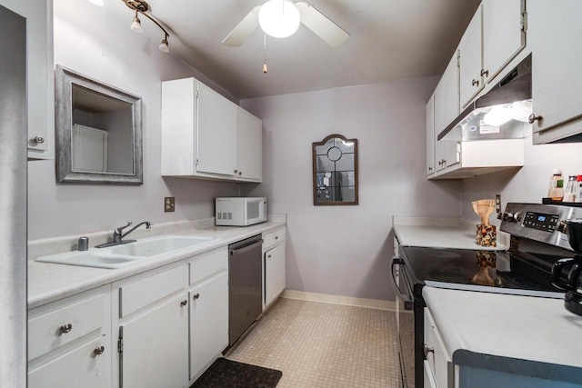 3410 Valley Ridge Rd Unit 1, Middleton, WI 53562 - kitchen featuring stainless steel appliances, under cabinet range hood, a sink, ceiling fan, and light countertops