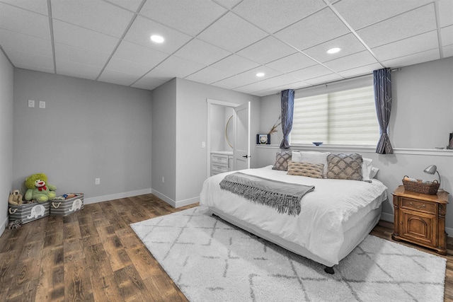 W7181 Duck Creek Ave, Westfield, WI 53964 - bedroom with recessed lighting, baseboards, a drop ceiling, and wood finished floors