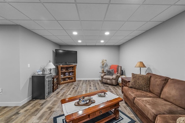 W7181 Duck Creek Ave, Westfield, WI 53964 - living area featuring baseboards, recessed lighting, wood finished floors, and a paneled ceiling