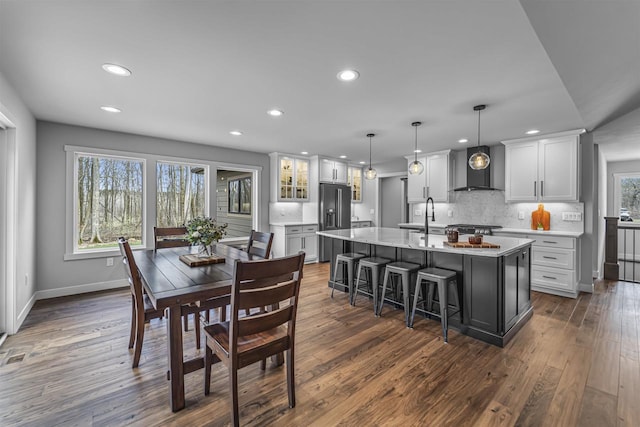 W7181 Duck Creek Ave, Westfield, WI 53964 - dining area featuring baseboards, dark wood-style flooring, and recessed lighting