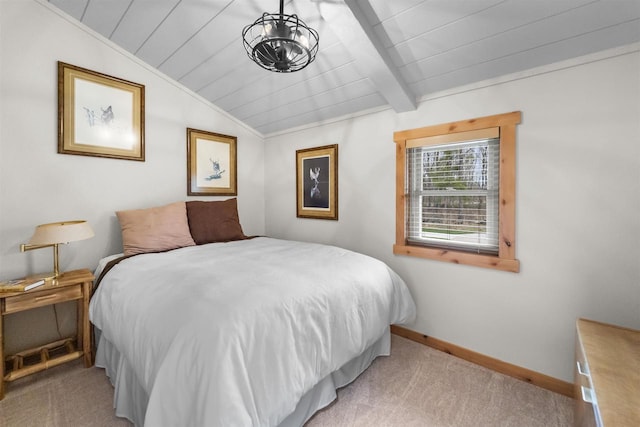 W7181 Duck Creek Ave, Westfield, WI 53964 - bedroom featuring baseboards, lofted ceiling with beams, and light carpet