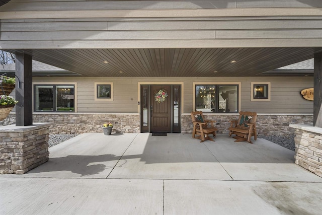 W7181 Duck Creek Ave, Westfield, WI 53964 - property entrance with a porch and stone siding