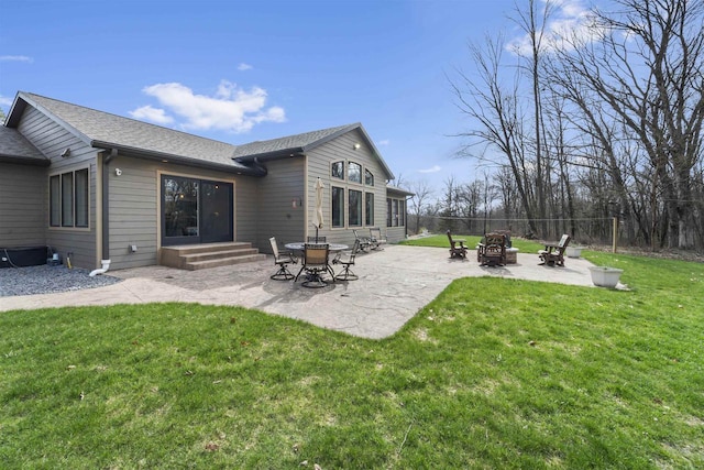 W7181 Duck Creek Ave, Westfield, WI 53964 - back of house featuring a yard, fence, entry steps, and an outdoor fire pit