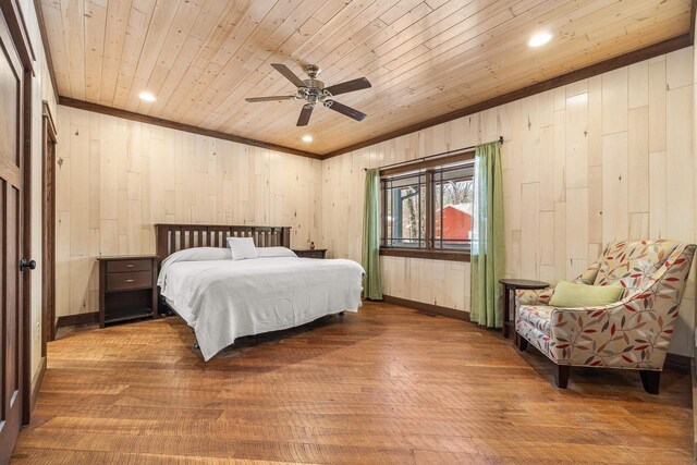 3853 County Rd E, Junction City, WI 54443 - bedroom with wooden walls, wooden ceiling, wood finished floors, recessed lighting, and ceiling fan