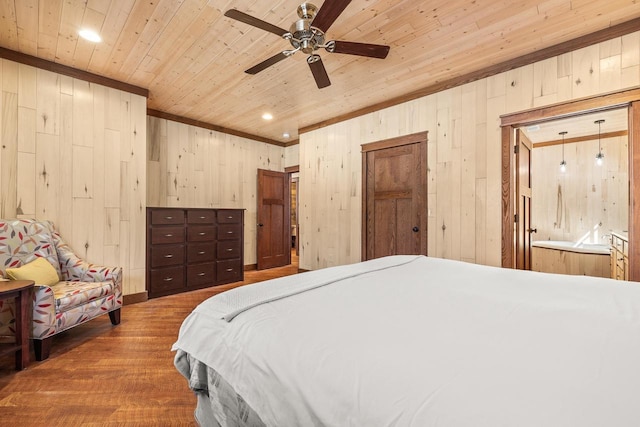 3853 County Rd E, Junction City, WI 54443 - bedroom featuring wooden ceiling, wood finished floors, wood walls, a ceiling fan, and recessed lighting