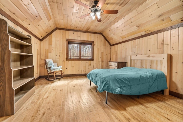 3853 County Rd E, Junction City, WI 54443 - bedroom with vaulted ceiling, hardwood / wood-style flooring, wood ceiling, wood walls, and baseboards