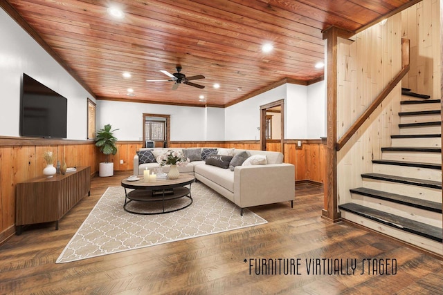 3853 County Rd E, Junction City, WI 54443 - living area with a wainscoted wall, wood ceiling, wood walls, stairway, and a ceiling fan