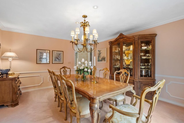 1012 E Kramer Ln, Appleton, WI 54915 - dining room with crown molding, a decorative wall, light colored carpet, a chandelier, and wainscoting